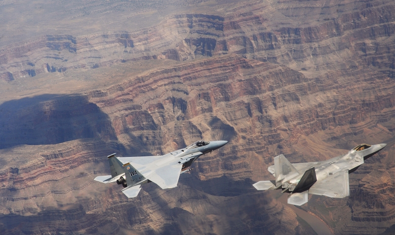 11. A U.S. Air Force F-22A Raptor Stealth Fighter and a U.S. Air Force F-15C Eagle Fighter Jet Fly Over the Grand Canyon, July 16, 2010, Grand Canyon National Park, State of Arizona, USA. Photo Credit: Master Sgt. Kevin J. Gruenwald, United States Air Force; AF.mil - Photos (http://www.af.mil/photos, 100716-F-6911G-180), United States Department of Defense (DoD, http://www.DefenseLink.mil or http://www.dod.gov), Government of the United States of America (USA).