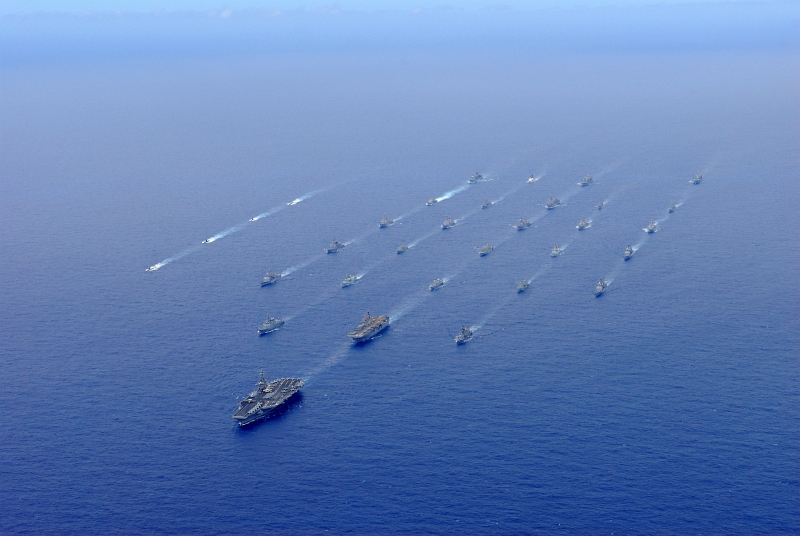 39. Rim of the Pacific (RIMPAC) 2010 Exercise: U.S. Navy Aircraft Carrier USS Ronald Reagan (CVN 76) Transits the Pacific Ocean With Ships and Submarines Assigned to RIMPAC 2010 Combined Task Force North of State of Hawaii, USA, July 24, 2010, Photo Credit: Mass Communication Specialist 3rd Class Dylan McCord, United States Navy; Defense Visual Information (DVI, http://www.DefenseImagery.mil, 100724-N-SB672-926) and United States Navy (USN, http://www.navy.mil), United States Department of Defense (DoD, http://www.DefenseLink.mil or http://www.dod.gov), Government of the United States of America (USA).