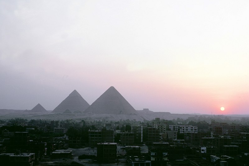 2. Sunset and a View of One of the Seven Wonders of the World, the Great Pyramids, Cairo, Jumhuriyat Misr al-Arabiyah - Arab Republic of Egypt. Photo Credit: DoD Stock Photos; Defense Visual Information Center (DVIC, http://www.DoDMedia.osd.mil, DFST9905291), United States Department of Defense (DoD, http://www.DefenseLink.mil or http://www.dod.gov), Government of the United States of America (USA).