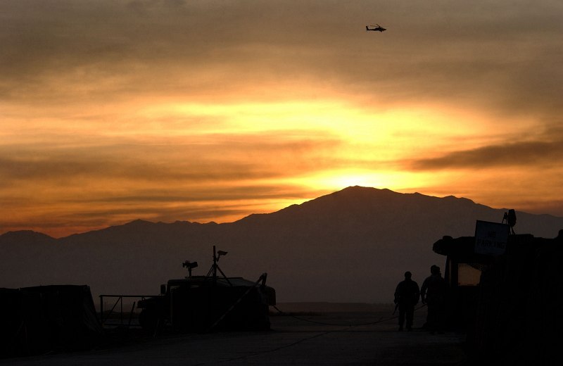 8. Sunrise Over Bagram Air Base, January 15, 2003, Parvan Province, Jomhuri-ye Eslami-ye Afghanestan - Islamic Republic of Afghanistan. Photo Credit: Staff Sgt. Cherie A. Thurlby, 1st Combat Camera, 1 CTCS Deployed, United States Air Force (USAF, http://www.af.mil); Defense Visual Information Center (DVIC, http://www.DoDMedia.osd.mil, DFSD0413828 and 030115F7203T001) and United States Air Force (USAF, http://www.af.mil), United States Department of Defense (DoD, http://www.DefenseLink.mil or http://www.dod.gov), Government of the United States of America (USA).
