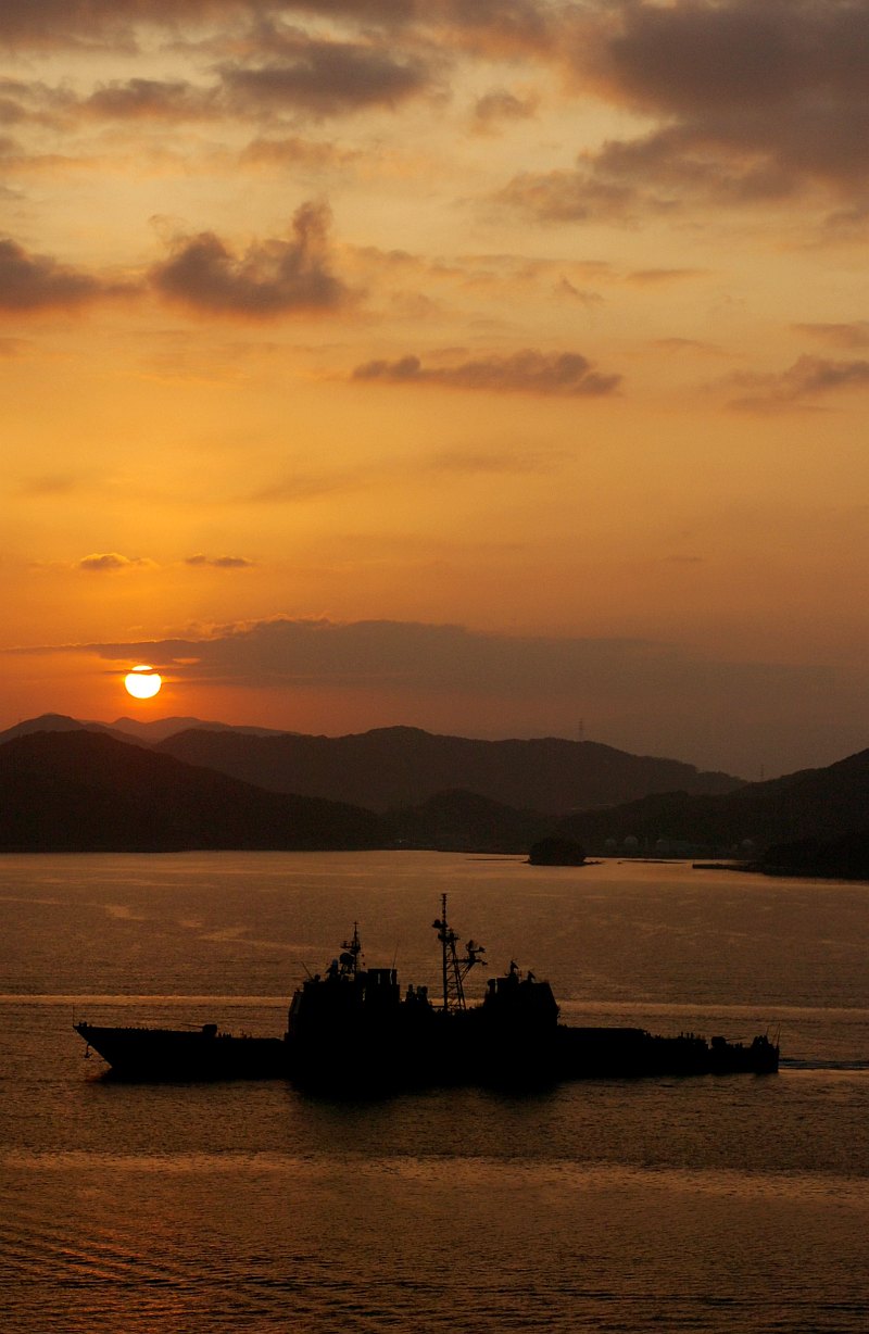 38. Sol -- Earth's Sun -- Rising or Setting Over the Mountains, February 24, 2007, Sasebo, Nippon-koku (Nihon-koku) - Japan. Photo Credit: Mass Communication Specialist 3rd Class Sarah Foster, Navy NewsStand - Eye on the Fleet Photo Gallery (http://www.news.navy.mil/view_photos.asp, 070224-N-7730F-001), United States Navy (USN, http://www.navy.mil), United States Department of Defense (DoD, http://www.DefenseLink.mil or http://www.dod.gov), Government of the United States of America (USA).