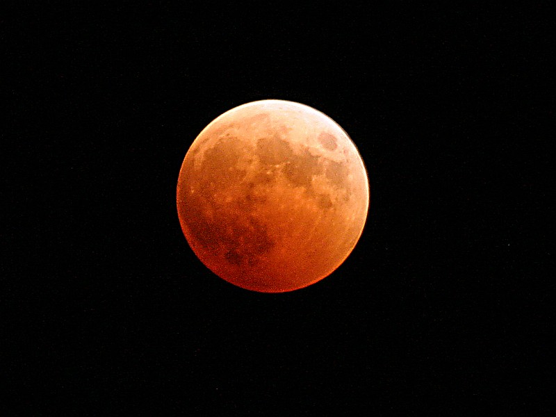 65. Rich Shades and Combinations of Orange and Red Tints From Sunrises and Sunsets On Earth Reflect Off Earth's Full Moon During the Total Lunar Eclipse, October 27, 2004, As Seen From Naval Air Station Whidbey Island, State of Washington, USA. Photo Credit: Photographer's Mate 2nd Class Scott Taylor (PH2, AW/NAC), Navy NewsStand - Eye on the Fleet Photo Gallery (http://www.news.navy.mil/view_photos.asp, 041027-N-9500T-001), United States Navy (USN, http://www.navy.mil), United States Department of Defense (DoD, http://www.DefenseLink.mil or http://www.dod.gov), Government of the United States of America (USA).