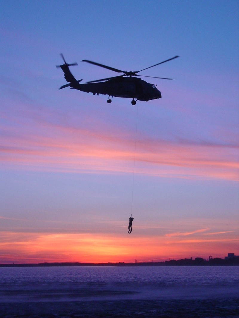 72. United States Navy SH-60B Seahawk Assigned to the 'Wolfpack' of Helicopter Anti-Submarine Squadron Light Four Five (HSL-45) Late Afternoon Training Operation at Sunset in Coronado Bay (Search And Rescue (SAR) Jump and Hoist Qualifications), San Diego, State of California, USA. Photo Credit: Lt. j.g. Jeff Valdes, Navy NewsStand - Eye on the Fleet Photo Gallery (http://www.news.navy.mil/view_photos.asp, 040212-N-0000V-001), United States Navy (USN, http://www.navy.mil), United States Department of Defense (DoD, http://www.DefenseLink.mil or http://www.dod.gov), Government of the United States of America (USA).