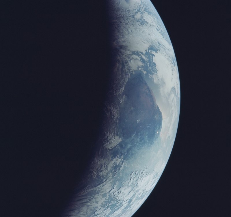 85. Total Darkness, Earth's Terminator, and Full Daylight, July 1969, As Seen From the NASA's Apollo 11 Spacecraft. Photo Credit: NASA; AS11-44-6692, Earth's terminator, Day side, Night side, Earth's limb, Ethiopia, Indian Ocean, Apollo 11 Mission; Image Science and Analysis Laboratory, NASA-Johnson Space Center. 'Astronaut Photography of Earth - Display Record.' <http://eol.jsc.nasa.gov/scripts/sseop/photo.pl?mission=AS11&roll=44&frame=6692>; National Aeronautics and Space Administration (NASA, http://www.nasa.gov), Government of the United States of America (USA).
