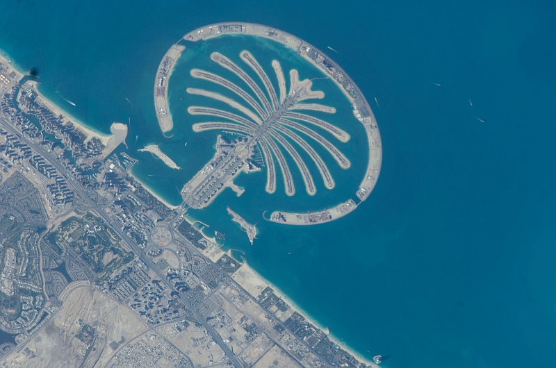 3. Palm Jumeirah, February 1, 2009 at 07:57:26 GMT, Dubai, Al Imarat al Arabiyah al Muttahidah - United Arab Emirates, As Seen From the International Space Station (Expedition 18), Latitude (LAT): 25.1, Longitude (LON): 53.1, Altitude (ALT): 189 Nautical Miles, Sun Azimuth (AZI): 165 degrees, Sun Elevation Angle (ELEV): 47 degrees. Photo Credit: NASA, International Space Station (Expedition Eighteen); ISS018-E-26061, Palm Jumeirah (The Palm Islands), Dubai, United Arab Emirates; Image Science and Analysis Laboratory, NASA-Johnson Space Center. 'Astronaut Photography of Earth - Display Record.' <http://eol.jsc.nasa.gov/scripts/sseop/photo.pl?mission=ISS018&roll=E&frame=26061>; National Aeronautics and Space Administration (NASA, http://www.nasa.gov), Government of the United States of America (USA).