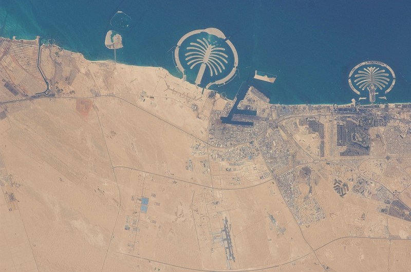 5. Palm Jebel Ali (Left) and Palm Jumeirah (Right), March 20, 2009 at 12:39:57 GMT, Dubai, Al Imarat al Arabiyah al Muttahidah - United Arab Emirates, As Seen From the International Space Station (Expedition 18), Latitude (LAT): 25.5, Longitude (LON): 55.1, Altitude (ALT): 191 Nautical Miles, Sun Azimuth (AZI): 258 degrees, Sun Elevation Angle (ELEV): 24 degrees. Photo Credit: NASA, International Space Station (Expedition Eighteen); ISS018-E-41938, Palm Jebel Ali and Palm Jumeirah (The Palm Islands), Dubai, United Arab Emirates; Image Science and Analysis Laboratory, NASA-Johnson Space Center. 'Astronaut Photography of Earth - Display Record.' <http://eol.jsc.nasa.gov/scripts/sseop/photo.pl?mission=ISS018&roll=E&frame=41938>; National Aeronautics and Space Administration (NASA, http://www.nasa.gov), Government of the United States of America (USA).