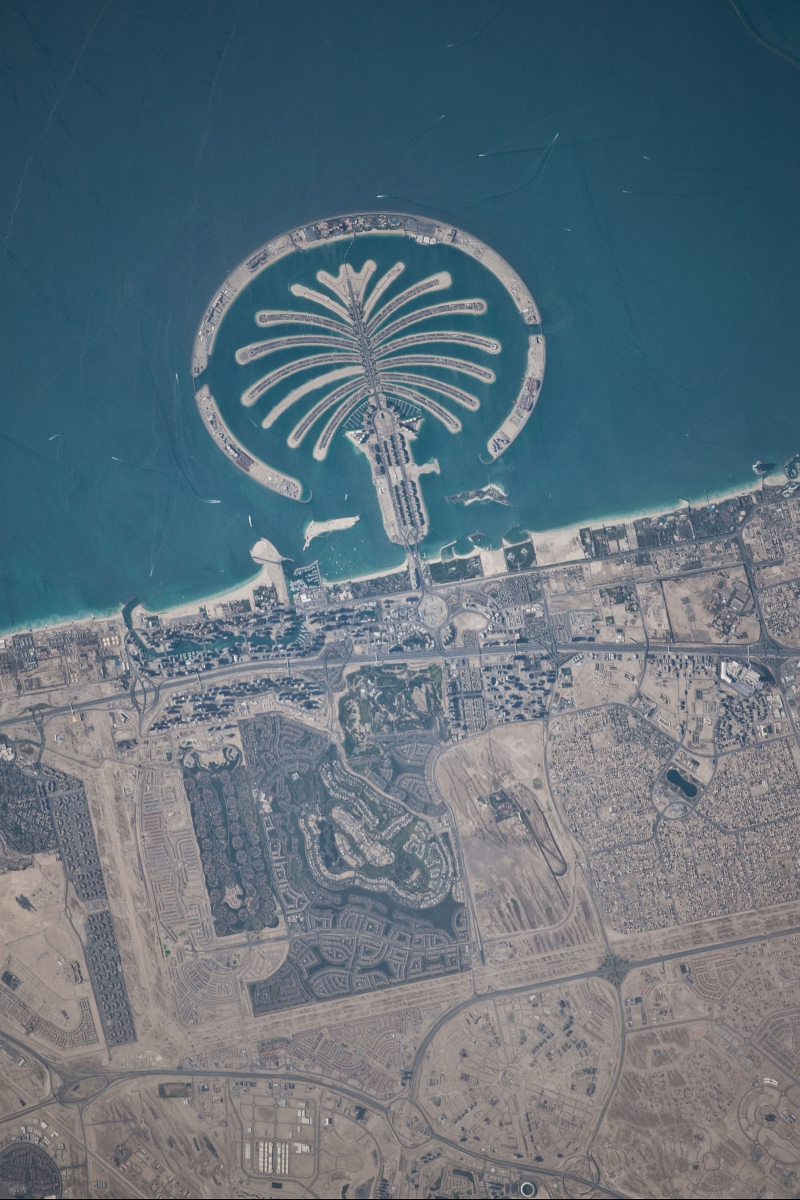 10. Palm Jumeirah, March 13, 2010 at 10:32:46 GMT, Dubai, Al Imarat al Arabiyah al Muttahidah - United Arab Emirates, As Seen From the International Space Station (Expedition 22), Latitude (LAT): 26.6, Longitude (LON): 56.1, Altitude (ALT): 183 Nautical Miles, Sun Azimuth (AZI): 231 degrees, Sun Elevation Angle (ELEV): 47 degrees. Photo Credit: NASA, International Space Station (Expedition Twenty-Two), ISS022-E-101580; Image Science and Analysis Laboratory, NASA-Johnson Space Center. 'Astronaut Photography of Earth - Display Record.' <http://eol.jsc.nasa.gov/scripts/sseop/photo.pl?mission=ISS022&roll=E&frame=101580>; National Aeronautics and Space Administration (NASA, http://www.nasa.gov), Government of the United States of America (USA).