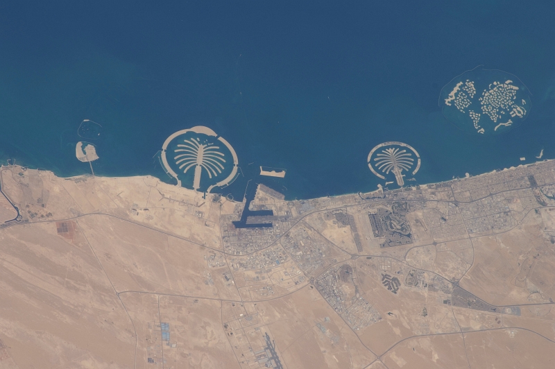 12. Palm Jebel Ali (Left), Palm Jumeirah (Center), and The World (Right), September 13, 2010 at 07:27:42 GMT, Dubai, Al Imarat al Arabiyah al Muttahidah - United Arab Emirates, As Seen From the International Space Station (Expedition 24), Latitude (LAT): 23.0 Longitude (LON): 55.1, Altitude (ALT): 187 Nautical Miles, Sun Azimuth (AZI): 147 degrees, Sun Elevation Angle (ELEV): 68 degrees. Photo Credit: NASA, International Space Station (Expedition Twenty-Four); ISS024-E-14312, Palm Jebel Ali and Palm Jumeirah (The Palm Islands), The World (World Islands), Dubai, United Arab Emirates; Image Science and Analysis Laboratory, NASA-Johnson Space Center. 'Astronaut Photography of Earth - Display Record.' <ISS024-E-14312>; National Aeronautics and Space Administration (NASA, http://www.nasa.gov), Government of the United States of America (USA).