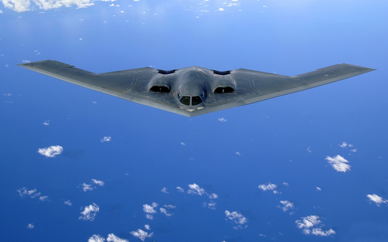 38. A U.S. Air Force B-2 Spirit Stealth Bomber Soars Over the Pacific Ocean After An Aerial Refueling Mission, May 30, 2006. Photo Credit: Staff Sgt. Bennie J. Davis III, Air Force Link - Photos (http://www.af.mil/photos, 060530-F-5040D-220, 'Over the Pacific'), United States Air Force (USAF, http://www.af.mil), United States Department of Defense (DoD, http://www.DefenseLink.mil or http://www.dod.gov), Government of the United States of America (USA).