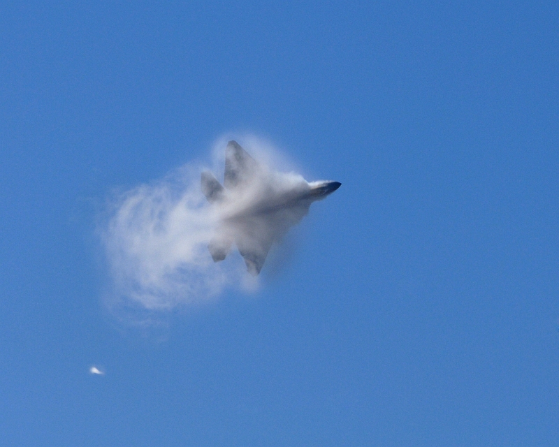 9. A U.S. Air Force F-22A Raptor Stealth Fighter Jet Executing A Maneuver Through A Cloud of Vapor While Performing at the 42nd Naval Base Ventura County Air Show, April 1, 2007, Point Mugu, State of California, USA. Photo Credit: Technical Sgt. Alex Koenig, United States Air Force; Defense Visual Information (DVI, http://www.DefenseImagery.mil, 070401-F-6278K-057) and United States Air Force (USAF, http://www.af.mil), United States Department of Defense (DoD, http://www.DefenseLink.mil or http://www.dod.gov), Government of the United States of America (USA).