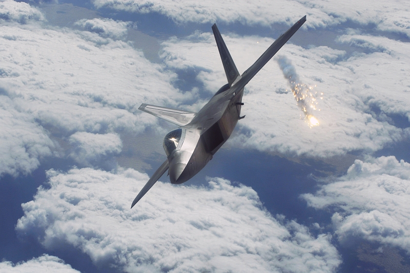 8. A United States Air Force F-22A Raptor Stealth Fighter Jet Deploys Flares High Above Kadena Air Base, Okinawa, Nippon-koku (Nihon-koku) - Japan, January 15, 2009. Photo Credit: Senior Airman Clay Lancaster, United States Air Force; Defense Visual Information (DVI, http://www.DefenseImagery.mil, 090115-F-0623L-885) and United States Air Force (USAF, http://www.af.mil), United States Department of Defense (DoD, http://www.DefenseLink.mil or http://www.dod.gov), Government of the United States of America (USA).