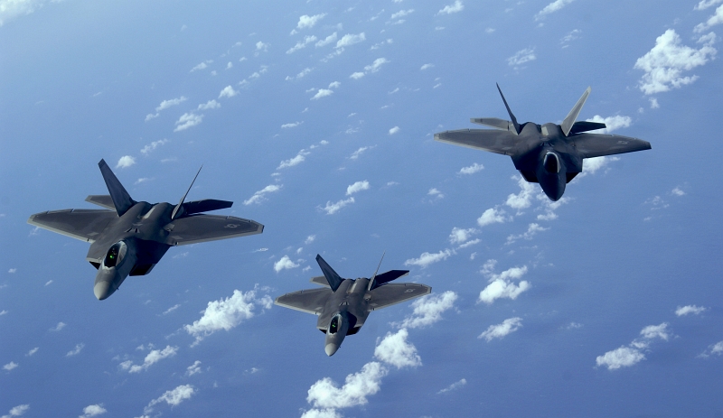 24. Three U.S. Air Force F-22A Raptor Stealth Fighters Flying Over the Pacific Ocean, January 28, 2009. Photo Credit: Master Sgt. Kevin J. Gruenwald, United States Air Force; Defense Visual Information (DVI, http://www.DefenseImagery.mil, 090128-F-6911G-047) and United States Air Force (USAF, http://www.af.mil), United States Department of Defense (DoD, http://www.DefenseLink.mil or http://www.dod.gov), Government of the United States of America (USA).