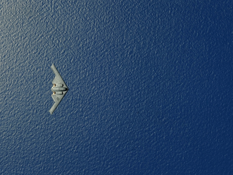 7. View From Above: A U.S. Air Force B-2 Spirit Stealth Bomber, Assigned to the 13th Expeditionary Bomb Squadron and Deployed to Territory of Guam, USA, Flies Over the Western Pacific Ocean During An Aerial Refueling Mission, May 12, 2009. Photo Credit: Senior Airman Christopher Bush, United States Air Force; Defense Visual Information (DVI, http://www.DefenseImagery.mil, 090512-F-2482B-025) and United States Air Force (USAF, http://www.af.mil), United States Department of Defense (DoD, http://www.DefenseLink.mil or http://www.dod.gov), Government of the United States of America (USA).