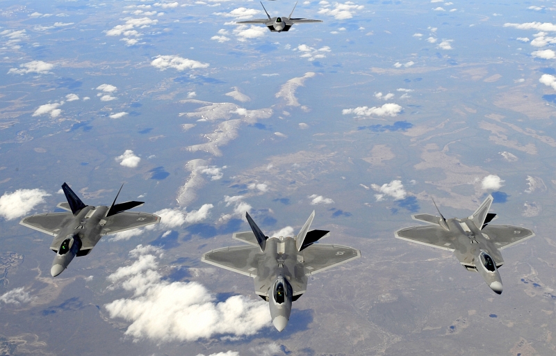 37. Four U.S. Air Force F-22A Raptor Stealth Fighter Jets Fly Together, May 26, 2010, State of Alaska, USA. Photo Credit: Staff Sgt. Brian Ferguson, Air Force Link - Photos (http://www.af.mil/photos, 100526-F-2185F-134, 'Alaska refuel'), United States Air Force (USAF, http://www.af.mil), United States Department of Defense (DoD, http://www.DefenseLink.mil or http://www.dod.gov), Government of the United States of America (USA).