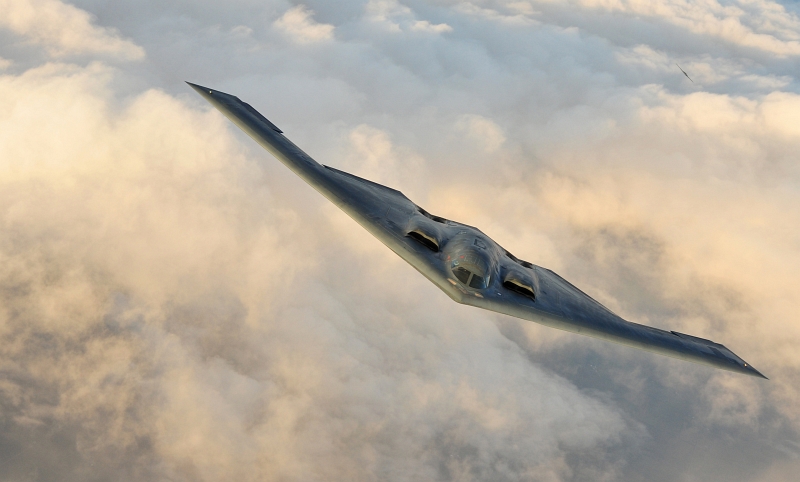 50. Two U.S. Air Force B-2 Spirit Stealth Bombers Soar Above the Clouds, September 9, 2011, State of Kansas, USA. Photo Credit: Senior Airman Courtney Witt, United States Air Force; Defense Visual Information (DVI, http://www.DefenseImagery.mil, 110909-F-QH266-265) and United States Air Force (USAF, http://www.af.mil), United States Department of Defense (DoD, http://www.DefenseLink.mil or http://www.dod.gov), Government of the United States of America (USA).