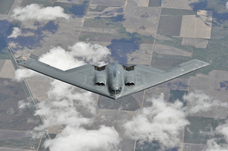 54. The U.S. Air Force B-2 Spirit Stealth Bomber (From Whiteman Air Force Base, Missouri) Descends and Departs After A Successful Mid-Air Refueling Mission From A KC-135R Stratotanker (Assigned to the 128th Air Refueling Wing In Milwaukee, Wisconsin), May 9, 2012, State of Colorado, USA. Photo Credit: Staff Sgt. Jeremy M. Wilson, United States Air Force; 120509-F-VV395-106; United States Air Force (USAF, http://www.af.mil), United States Department of Defense (DoD, http://www.DefenseLink.mil or http://www.dod.gov), Government of the United States of America (USA).