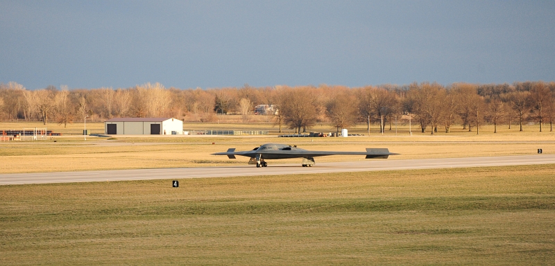 43. A U.S. Air Force B-2 Spirit Stealth Bomber Lands On the Runway, April 1, 2013, Whiteman Air Force Base, State of Missouri, USA. Photo Credit: Staff Sgt. Nick Wilson, Air Force Link - Photos (http://www.af.mil/photos, 130401-F-EA289-117, 'First B-2 surpasses 7,000 flight hours'), United States Air Force (USAF, http://www.af.mil), United States Department of Defense (DoD, http://www.DefenseLink.mil or http://www.dod.gov), Government of the United States of America (USA).
