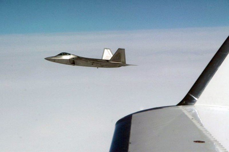 27. Joint NORAD-Russian Federation Exercise VIGILANT EAGLE: High Above the Pacific Ocean, a U.S. Air Force F-22A Raptor Stealth Fighter Jet Intercepts and Escorts a Gulfstream IV (Gulfstream 4 or Gulfstream G-400) Jet (Code-named "Fencing 1220") During the International Hijacking Scenario, August 2010. Photo Credit: Major Michael S. Humphreys, United States Army; North American Aerospace Defense Command (NORAD, http://www.norad.mil, 100808-A-0000H-008), United States Department of Defense (DoD, http://www.DefenseLink.mil or http://www.dod.gov), Government of the United States of America (USA).