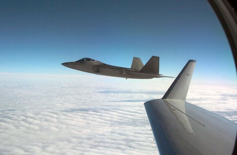 25. Joint NORAD-Russian Federation Exercise VIGILANT EAGLE: High Above Alaska, a U.S. Air Force F-22A Raptor Stealth Fighter Jet Intercepts and Escorts a Gulfstream IV (Gulfstream 4) Jet (Code-named "Fencing 1220") During the International Hijacking Scenario, August 2010, State of Alaska, USA. Photo Credit: Major Michael S. Humphreys, United States Army; North American Aerospace Defense Command (NORAD, http://www.norad.mil, 100810-A-6937H-362), United States Department of Defense (DoD, http://www.DefenseLink.mil or http://www.dod.gov), Government of the United States of America (USA).