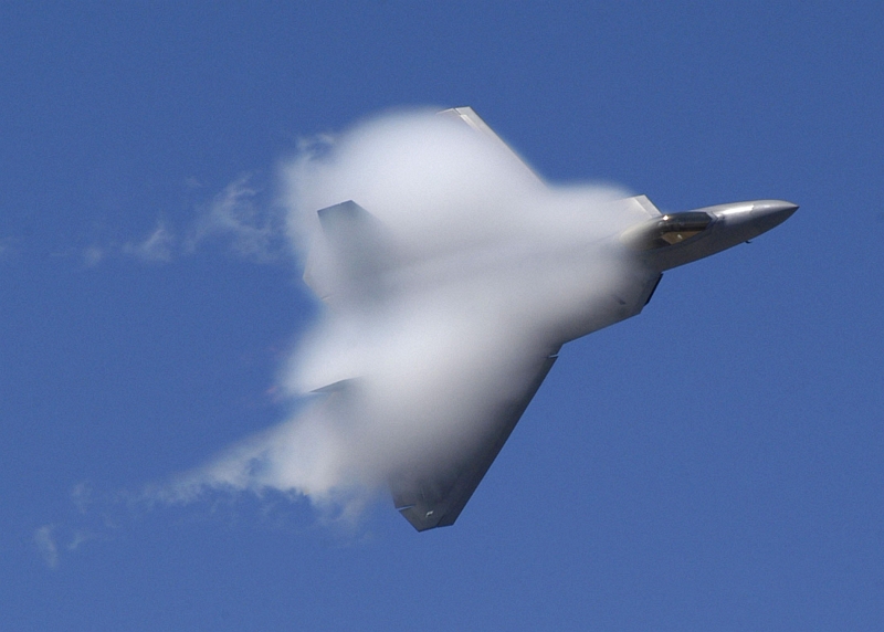 39. Covered With White Vapor, A U.S. Air Force F-22A Raptor Stealth Fighter Jet Executes An Aerial Maneuver at the 42nd Naval Base Ventura County (NBVC) Air Show, April 1, 2007, Point Mugu, State of California, USA. Photo Credit: Mass Communication Specialist 2nd Class Jason R. Williams, United States Navy; Defense Visual Information (DVI, http://www.DefenseImagery.mil, 070401-N-QE507-097, DNSD0804571, and DN-SD-08-04571) and United States Navy (USN, http://www.navy.mil), United States Department of Defense (DoD, http://www.DefenseLink.mil or http://www.dod.gov), Government of the United States of America (USA).