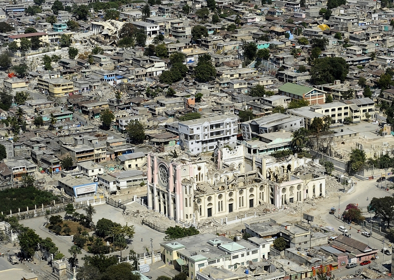 56. The Roman Catholic National Cathedral (Cathedral of Port-au-Prince) Was One of Many Buildings Severely Damaged By the 7.0-Magnitude Earthquake, January 28, 2010, Port-au-Prince, Republique d'Haiti (Repiblik d' Ayiti) - Republic of Haiti. Photo Credit: Mass Communication Specialist 2nd Class Kristopher Wilson, United States Navy; Defense Visual Information (DVI, http://www.DefenseImagery.mil, 100128-N-5345W-148) and United States Navy (USN, http://www.navy.mil), United States Department of Defense (DoD, http://www.DefenseLink.mil or http://www.dod.gov), Government of the United States of America (USA).