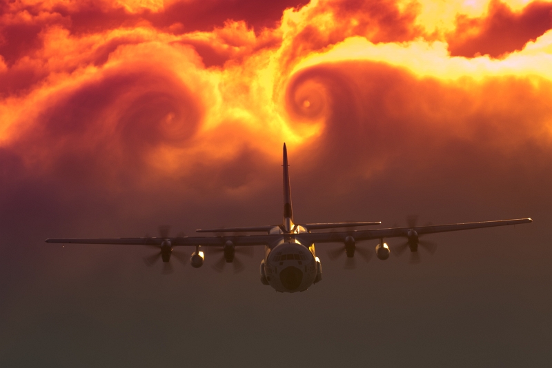 Two Vortices (Vortexes) Created By the U.S. Coast Guard C-130J Super Hercules Aircraft Swirl In the Clouds, April 16, 2009, State of North Carolina, USA. Photo Credit: Dave Silva, U.S. Coast Guard; United States Coast Guard (USCG, http://www.uscg.mil) Visual Information Gallery (http://cgvi.uscg.mil/media/main.php, 20090916-G-9091S-008), United States Department of Homeland Security (DHS, http://www.dhs.gov), Government of the United States of America (USA).