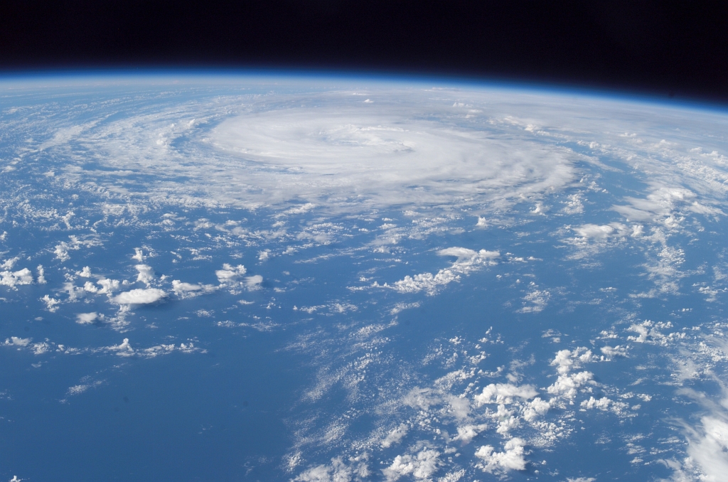 Hurricane Epsilon Over the North Atlantic Ocean Backdropped By the Blackness of Space, December 3, 2005 at 15:37:45 GMT, As Seen From the International Space Station (Expedition 12), Latitude (LAT): 24.9, Longitude (LON): -36.1, Altitude (ALT): 191 Nautical Miles, Sun Azimuth (AZI): 205 degrees, Sun Elevation Angle (ELEV): 39 degrees. Photo Credit: NASA; ISS012-E-10131, Earth, Atmospheric limb, International Space Station (Expedition Twelve); Earth Science and Remote Sensing Unit, NASA-Johnson Space Center. "The Gateway to Astronaut Photography of Earth." <http://eol.jsc.nasa.gov/scripts/sseop/photo.pl?mission=ISS012&roll=E&frame=10131>; National Aeronautics and Space Administration (NASA, http://www.nasa.gov), Government of the United States of America (USA).